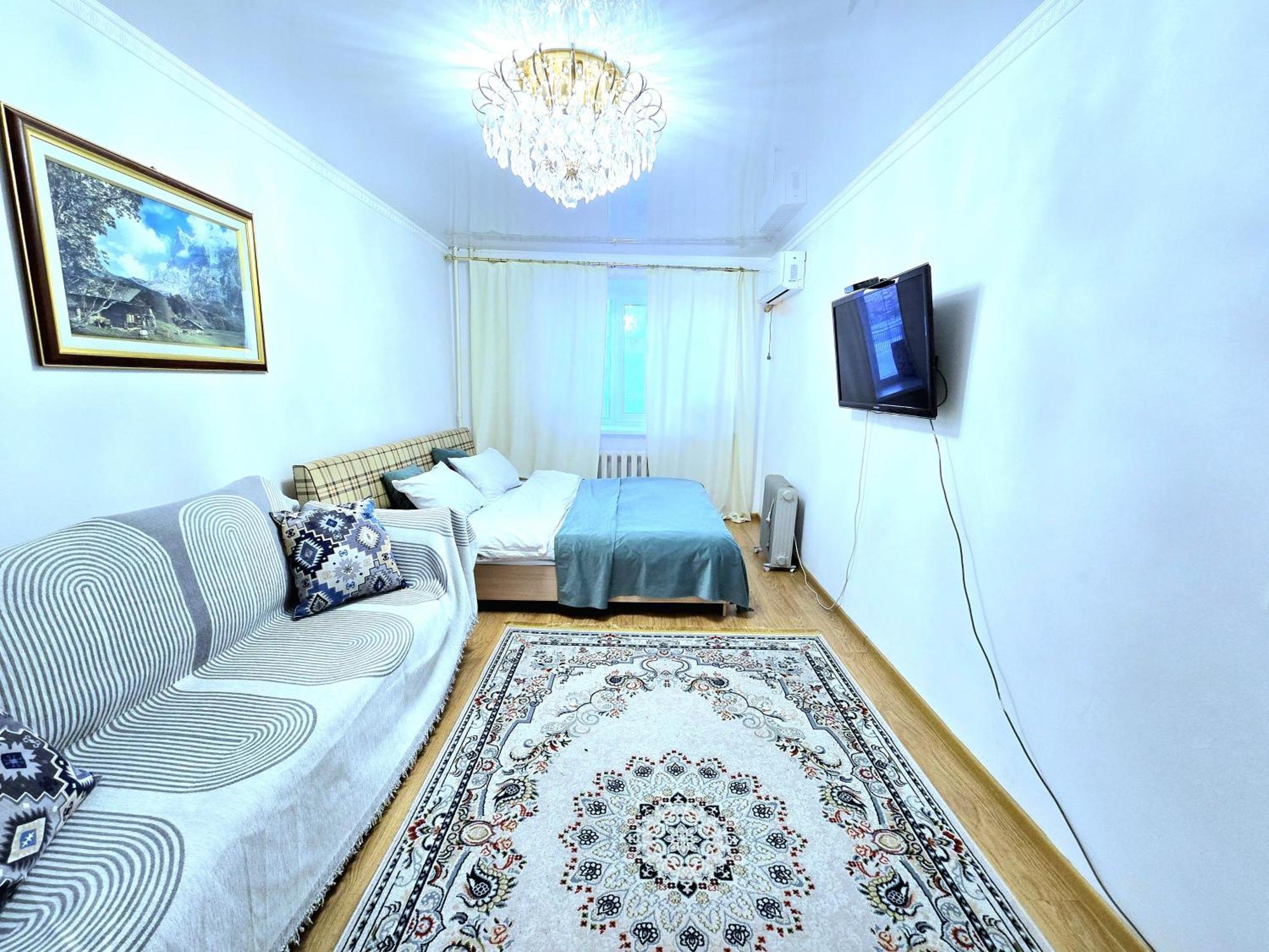 Двухкомнатная "Аэропорт Астана" Appartement Buitenkant foto